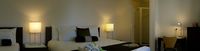 Deluxe room with a king bed and a single bed